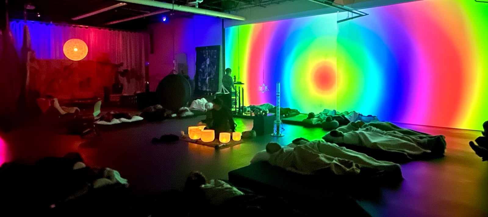 Projected rings of light across the studio wall
